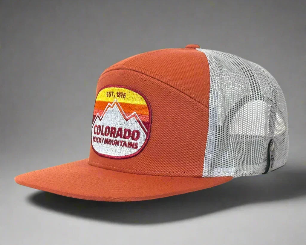 Orange Colorado Rocky Mountains mesh trucker hat with embroidered mountain patch