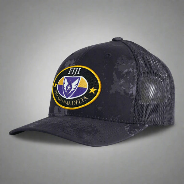 Black mesh trucker hat with FIJI Phi Gamma Delta embroidered patch on gray background