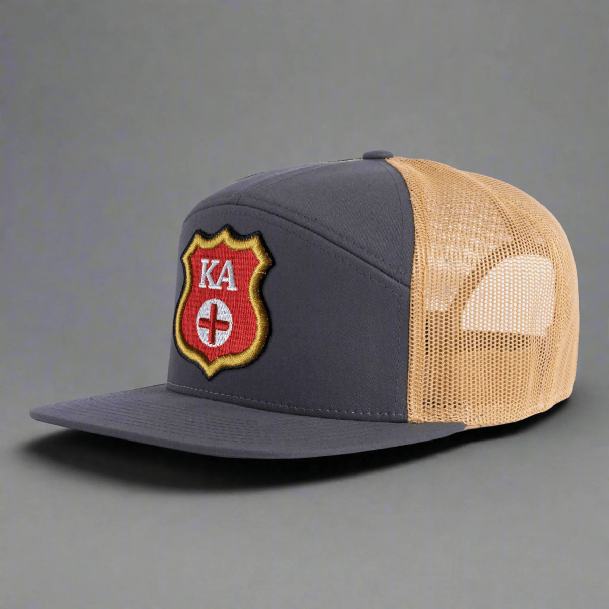 Gray and tan mesh trucker hat with KA red gold shield logo on front panel
