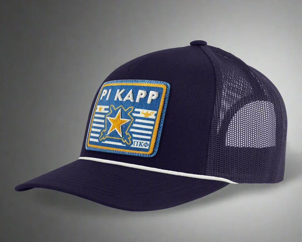 Navy blue mesh trucker hat with PI KAPP embroidered patch and star design