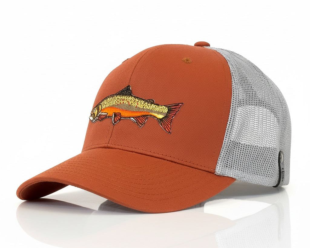 Orange and gray cap with fish design on a white background