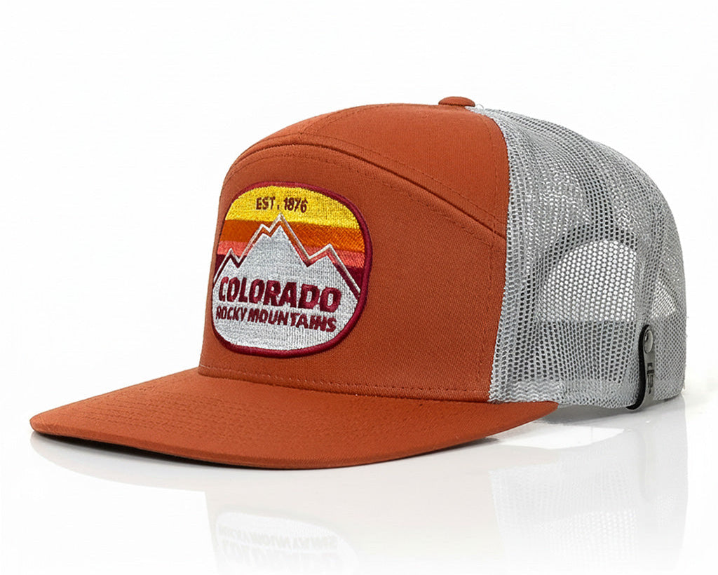 Orange and gray cap with a Colorado Rocky Mountains patch on a white background