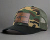 Camouflage baseball cap with 'COME AND TAKE IT' patch on a white background