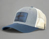 Gray and blue cap with a patch on a white background