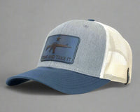 Gray and blue cap with a patch on a white background