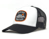 White and black cap with Glacier National Park patch on a white background