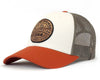 Trucker hat with white front panel, orange bill, and gray mesh back on a white background