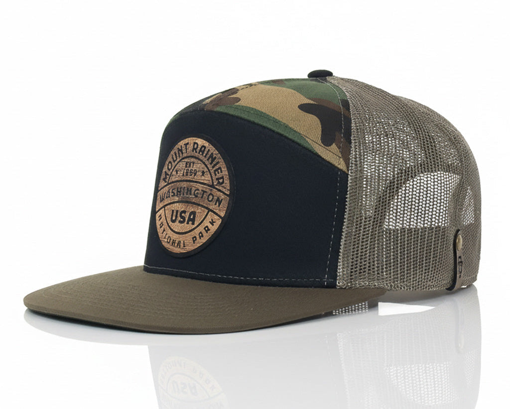 Camouflage baseball cap with mesh back on a white background