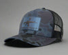 Camouflage cap with a patch featuring an rifle and 'COME AND TAKE IT' text on a gray background