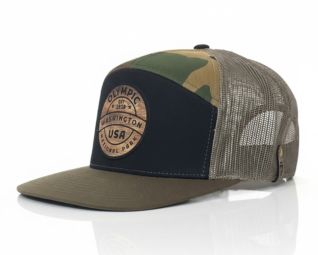 Camouflage and brown trucker cap with mesh back on a white background