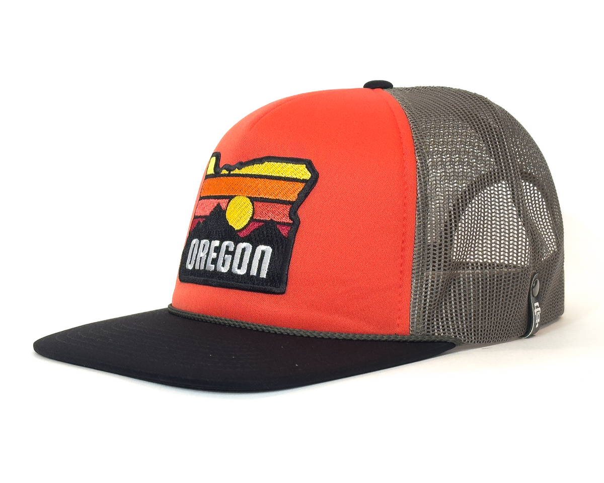 Trucker hat with 'Oregon' design on an orange and black background