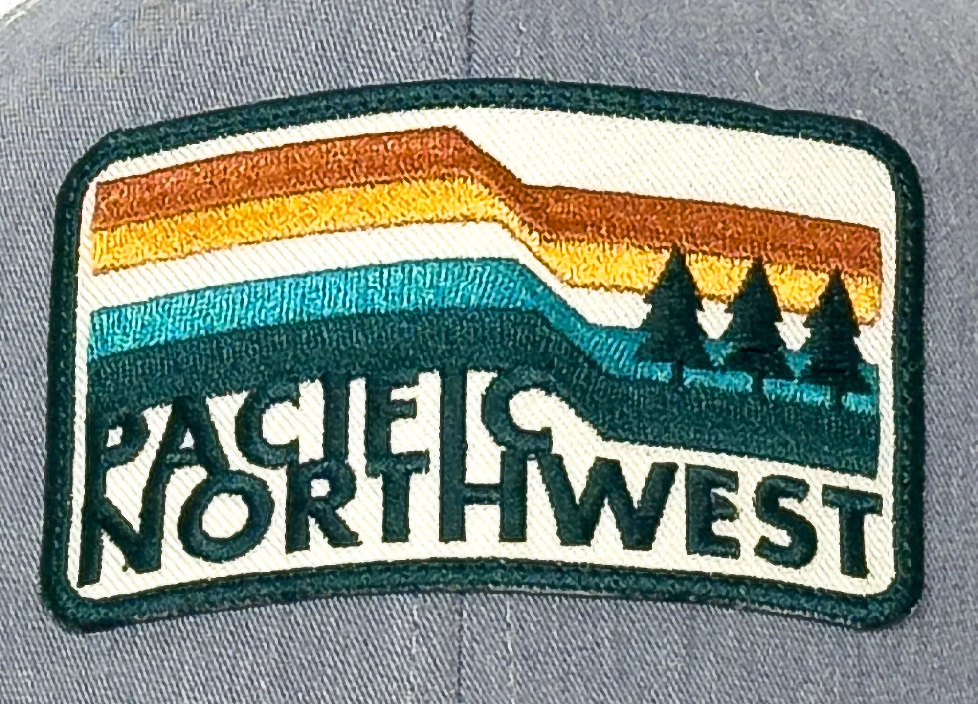 Patch with 'Pacifica Northwest' design on a gray background