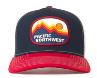 Navy and red cap with 'Pacific Northwest' logo on a white background