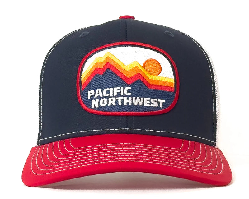 Navy and red cap with 'Pacific Northwest' logo on a white background
