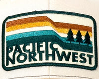 Patch with 'Pacific Northwest' text and mountain design on a cap