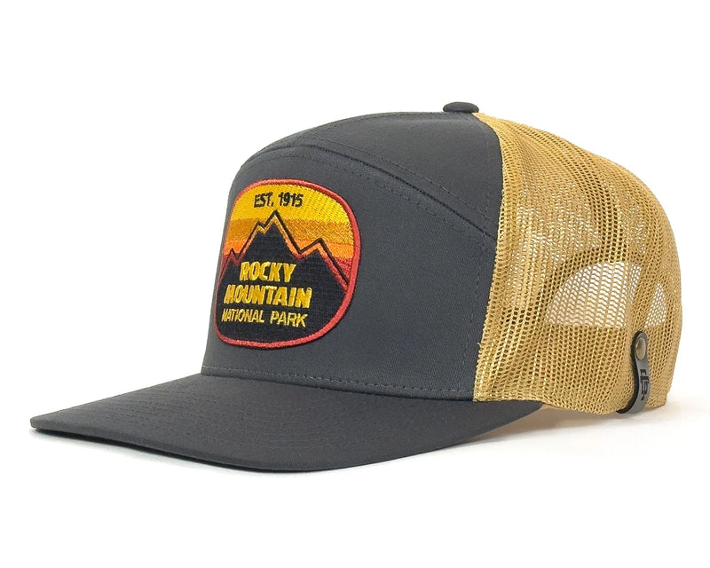 Gray and yellow cap with Rocky Mountain National Park patch on a white background