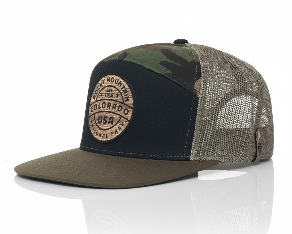 Camouflage and green cap with a logo on a white background