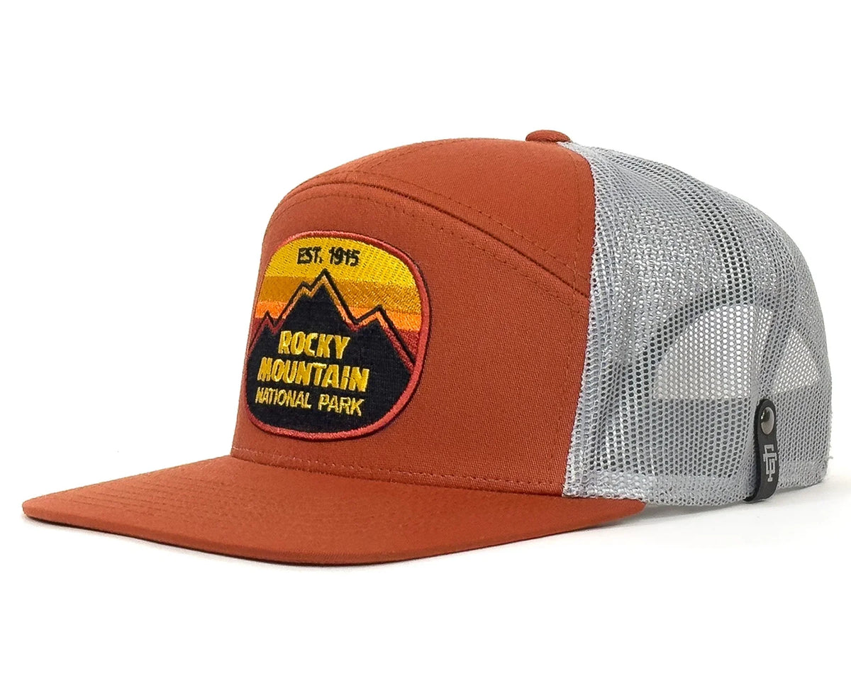 Brown and gray cap with Rocky Mountain National Park patch on a white background