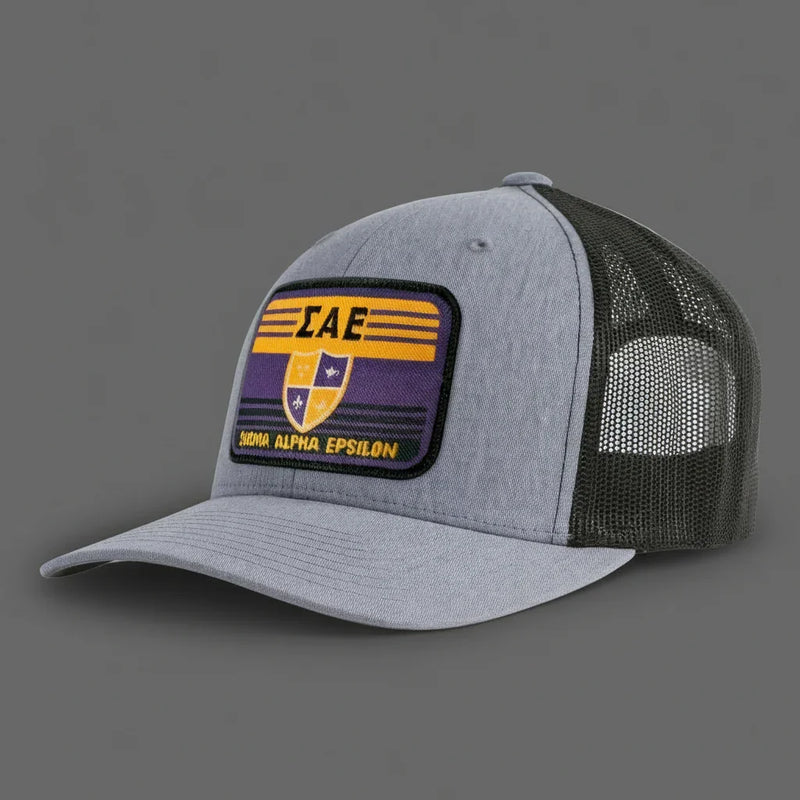 Gray and black mesh cap with a Sigma Alpha Epsilon patch on a white background