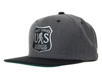 Gray cap with a Forest Service Sasquatch Department logo on a white background