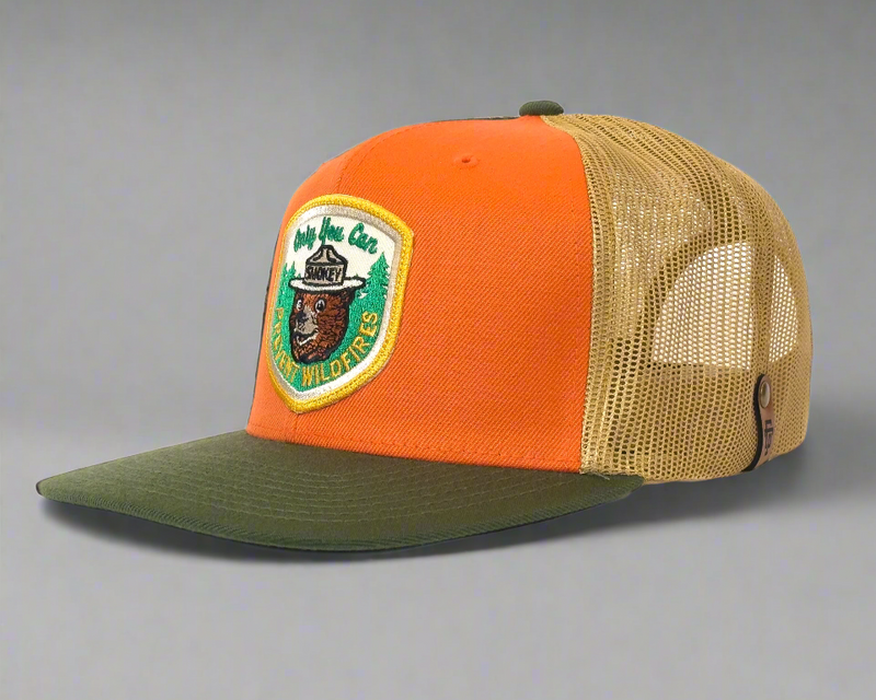 Orange and green cap with a patch on a white background