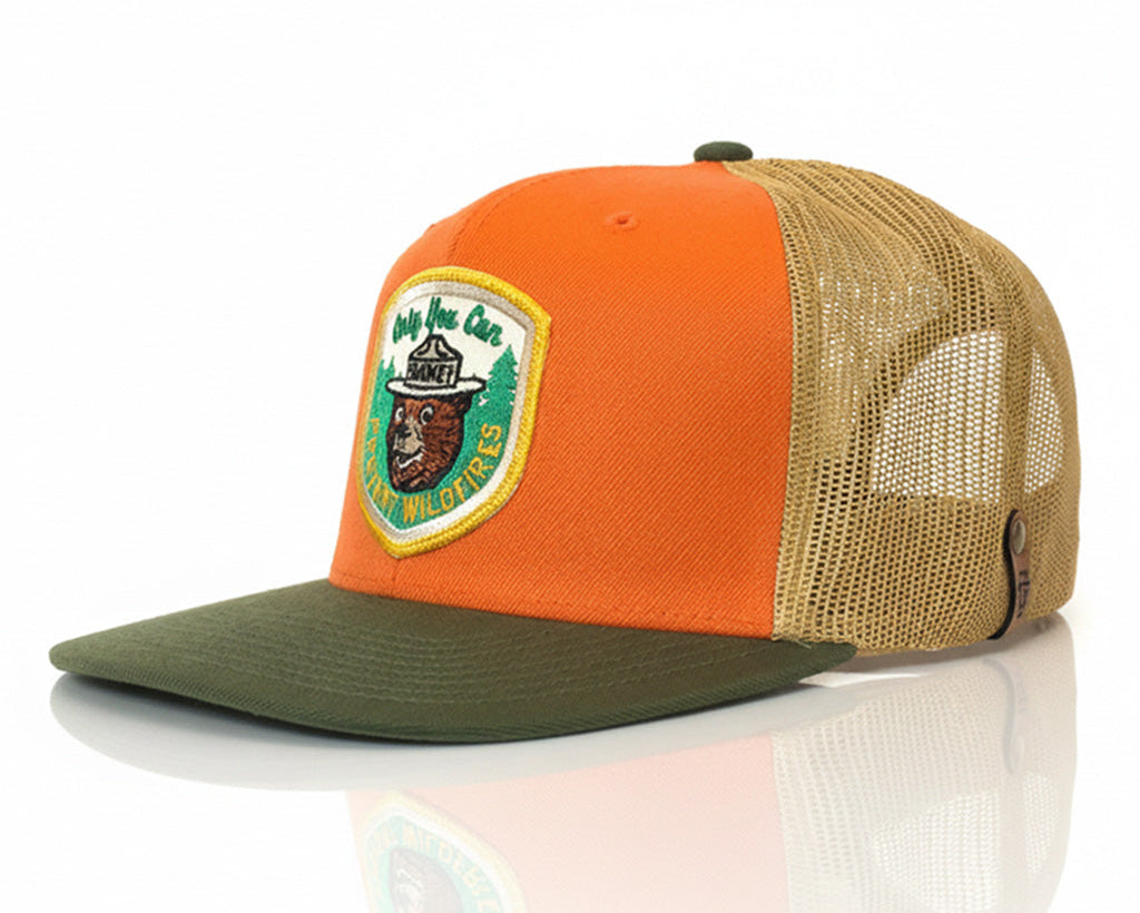 Orange, green, and beige cap with a logo on a white background