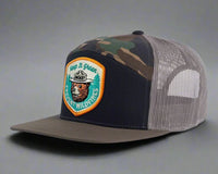 SMOKEY BEAR 7-Panel Flat Camo Hat, Richardson 168 Black