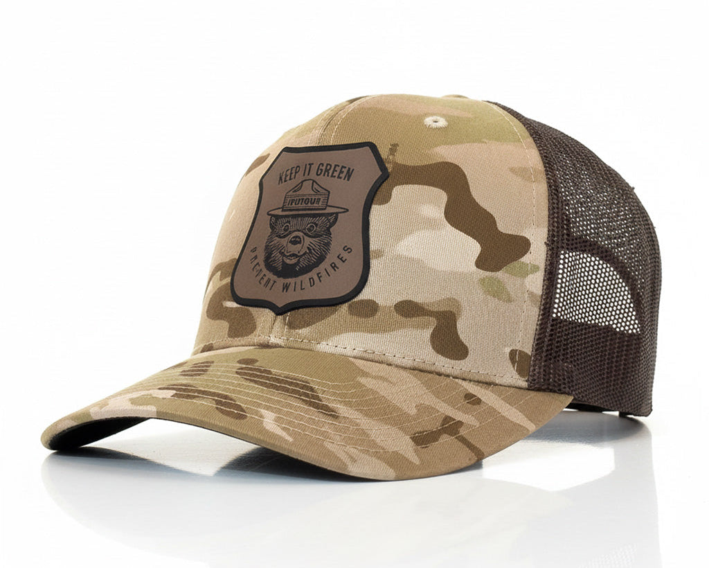 Camouflage baseball cap with a logo on a white background