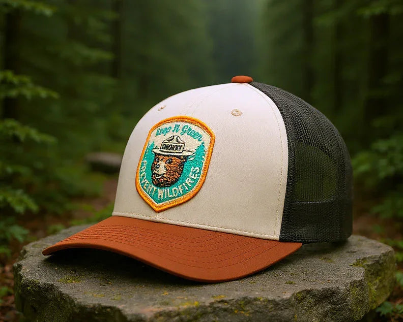 Cap with a patch on a stone in a forest setting