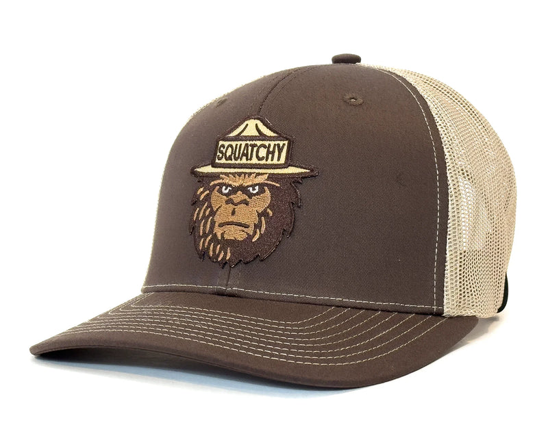 Brown and beige cap with a Sasquatch logo on a white background