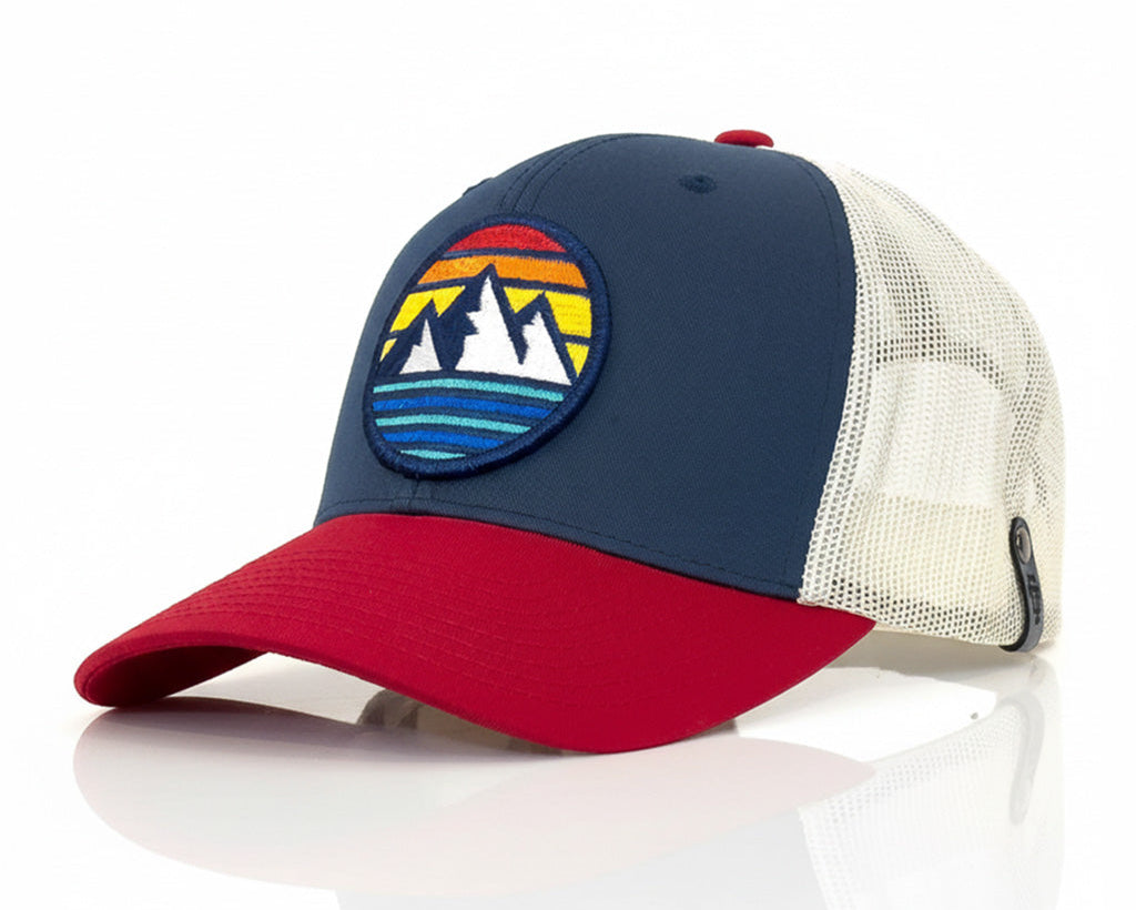 Trucker hat with a mountain design on a white background