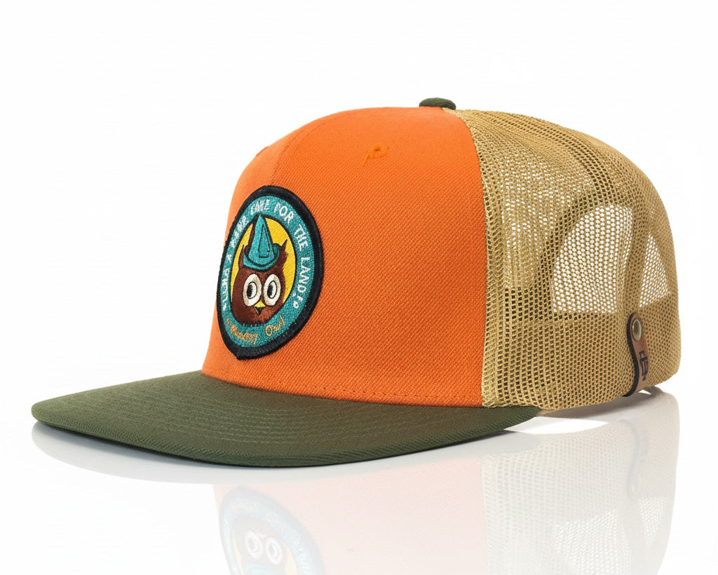 Three-tone cap with orange, beige, and green colors on a white background