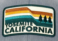 Embroidered patch with 'Yosemite California' text on a gray fabric background
