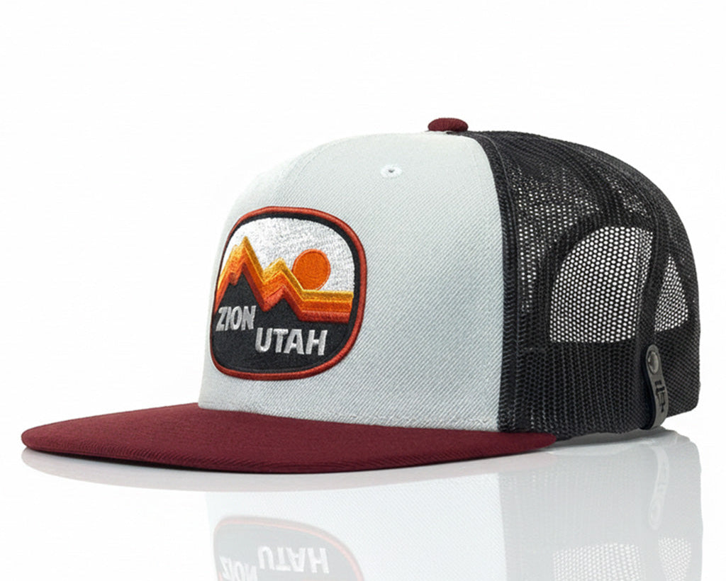 Trucker hat with Zion Utah patch on a white background