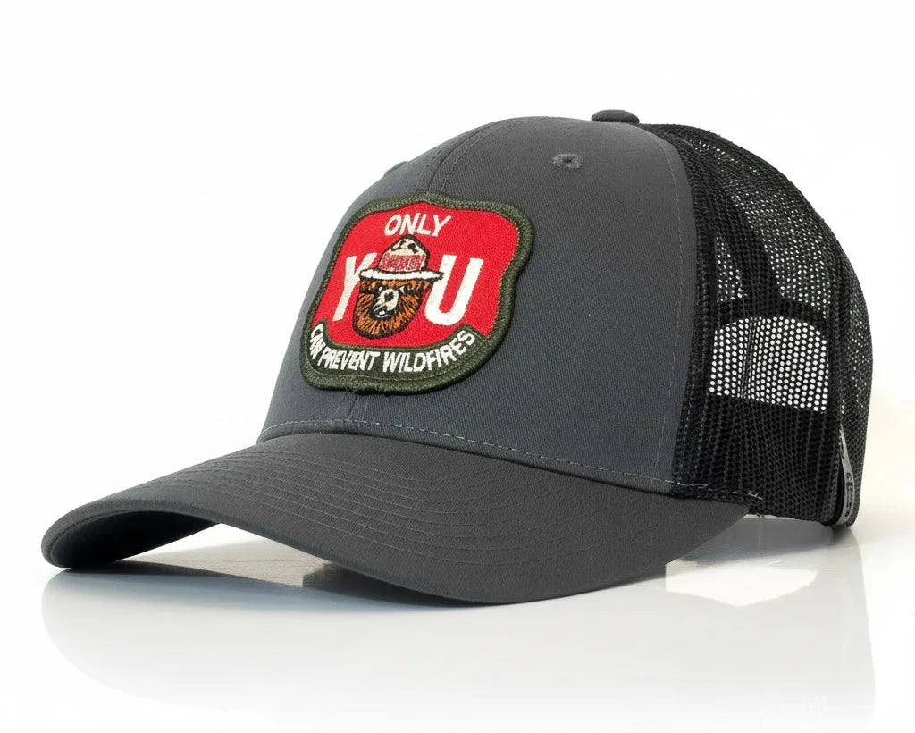 Gray cap with a red and green patch on a white background